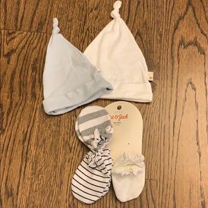 Set of baby hats and mittens